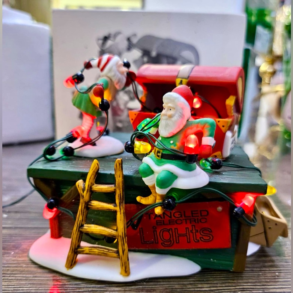 SOLD - Department 56 Untangle The Christmas Lights